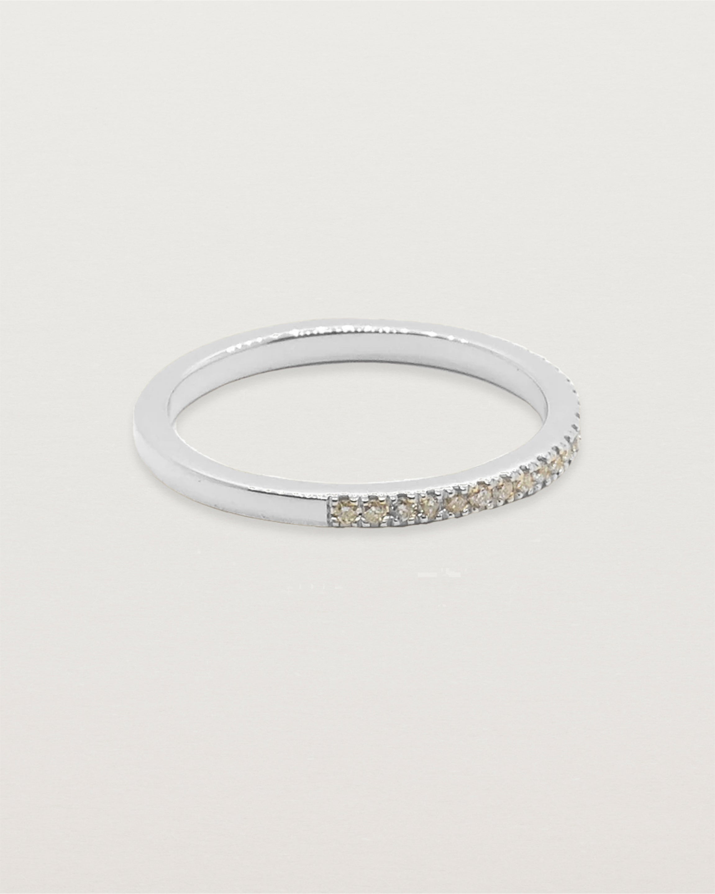 Front view of Annie band with champagne diamonds in white gold