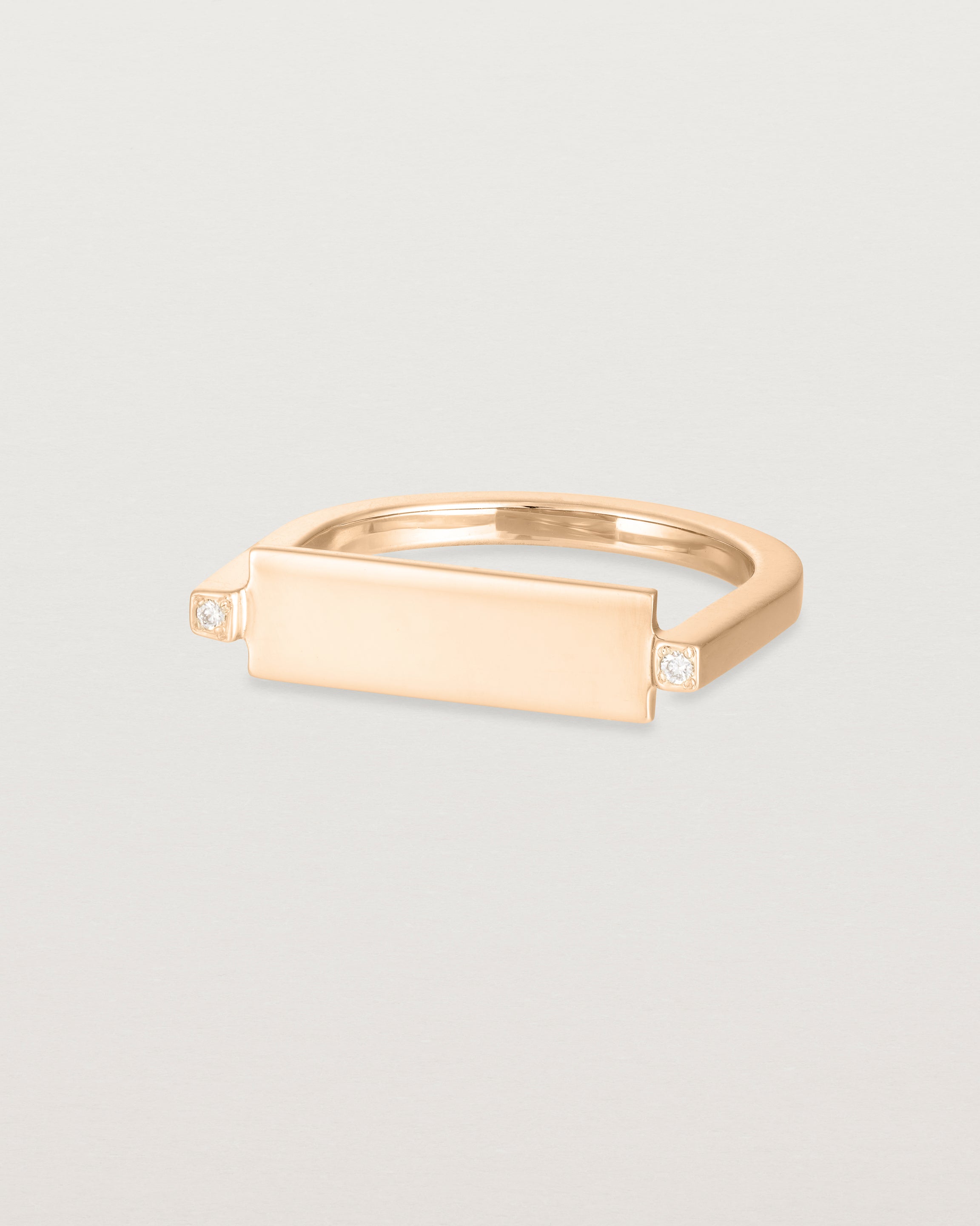 Slightly angled view of the Antares Plate Ring | Diamonds | Rose Gold.