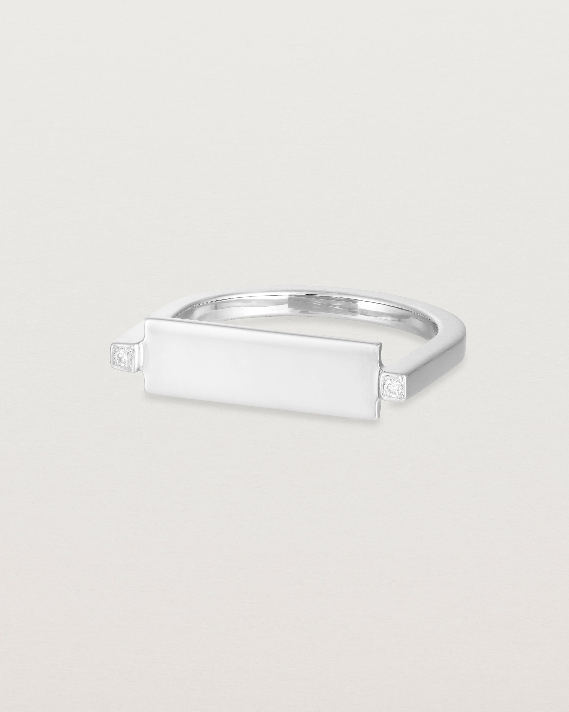 Angled view of the Antares Plate Ring | Diamonds | White Gold.