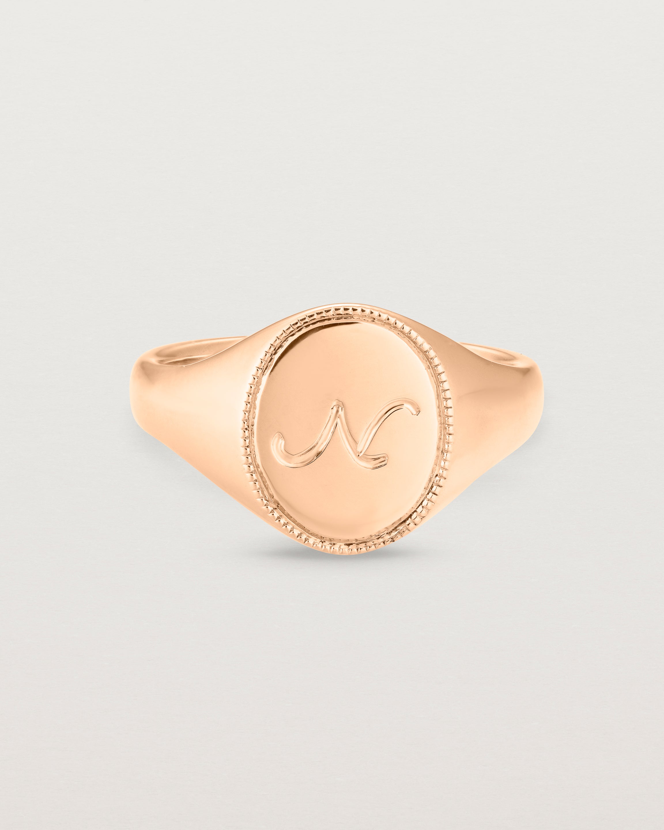 Front view of the Arden Signet Ring | Millgrain in rose gold.