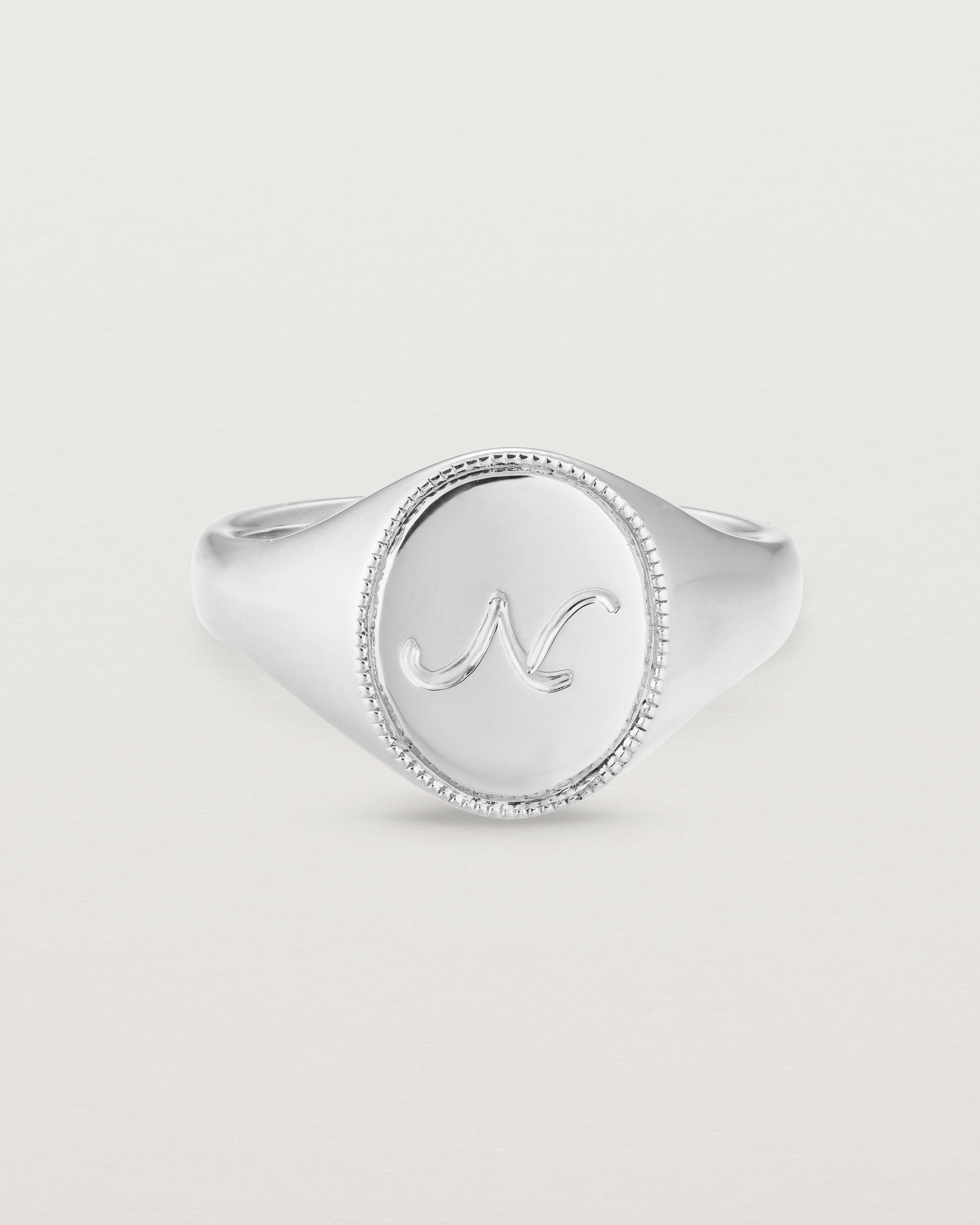 Front view of the Arden Signet Ring | Millgrain in white gold.