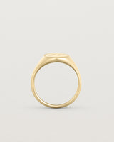 Standing view of the Arden Signet Ring | Millgrain in yellow gold.