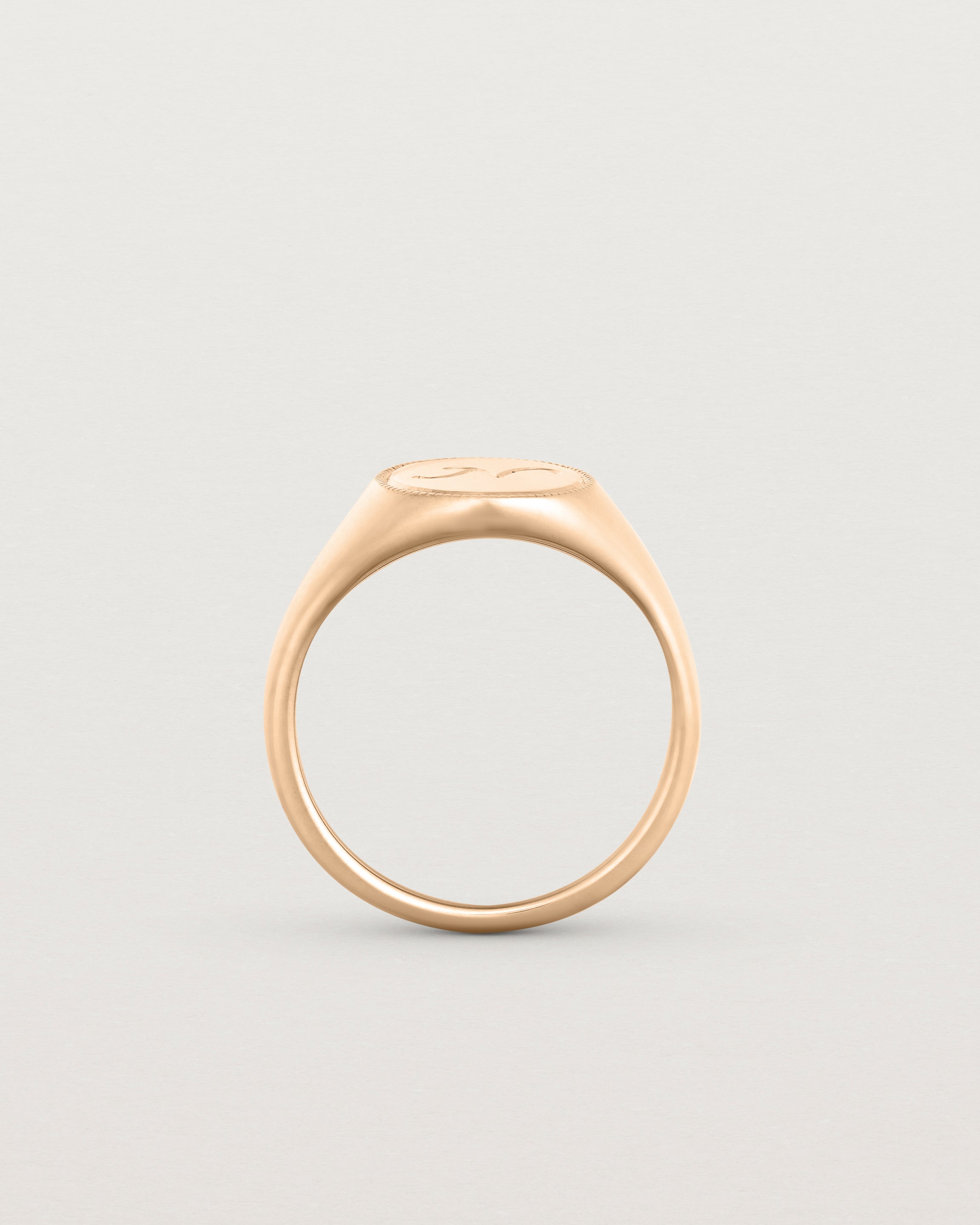 Standing view of the Arden Signet Ring | Millgrain in rose gold.