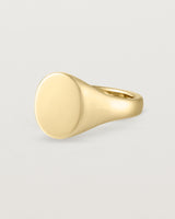 Angled view of the Arden Signet Ring in Yellow Gold.