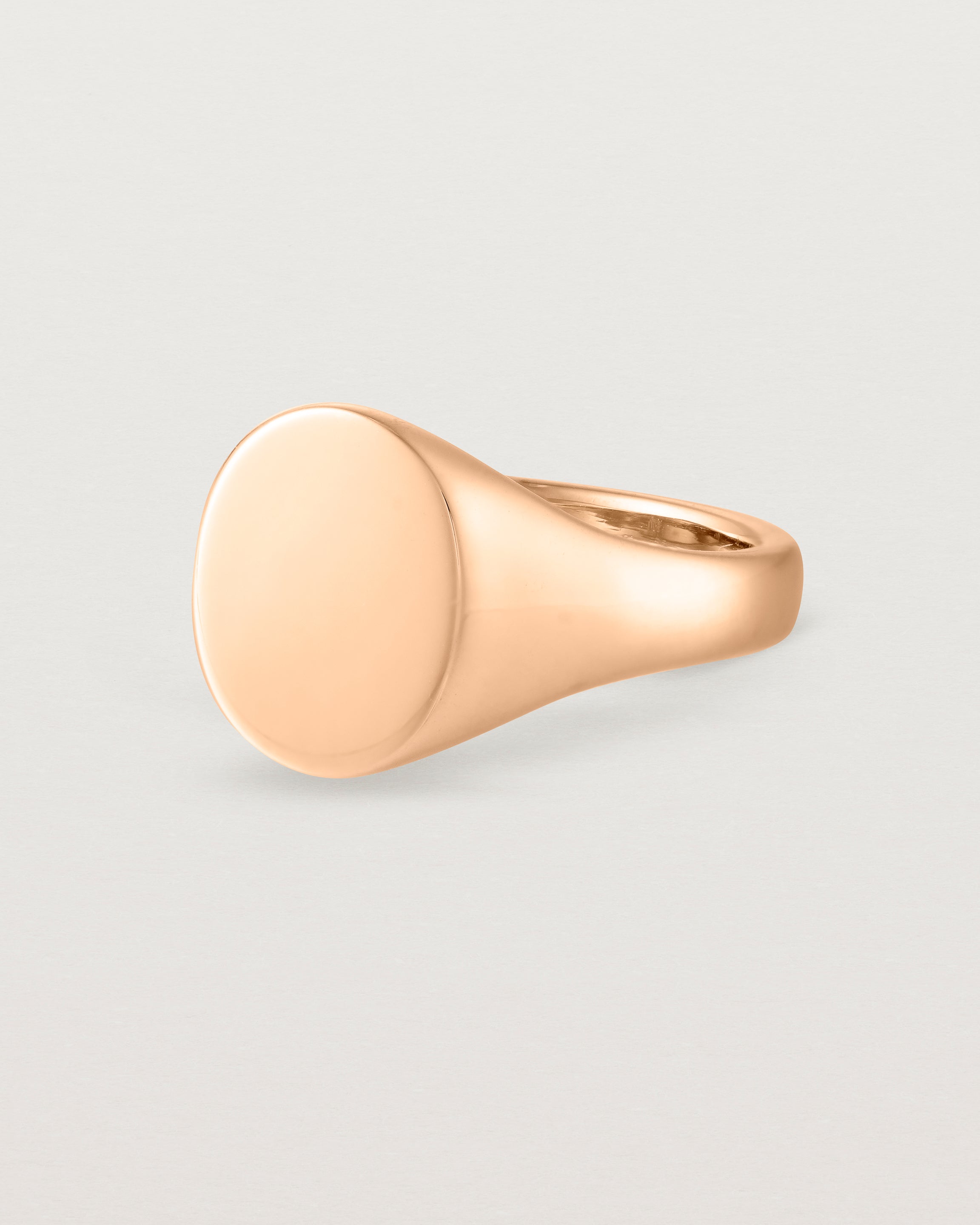 Angled view of the Arden Signet Ring in Rose Gold.