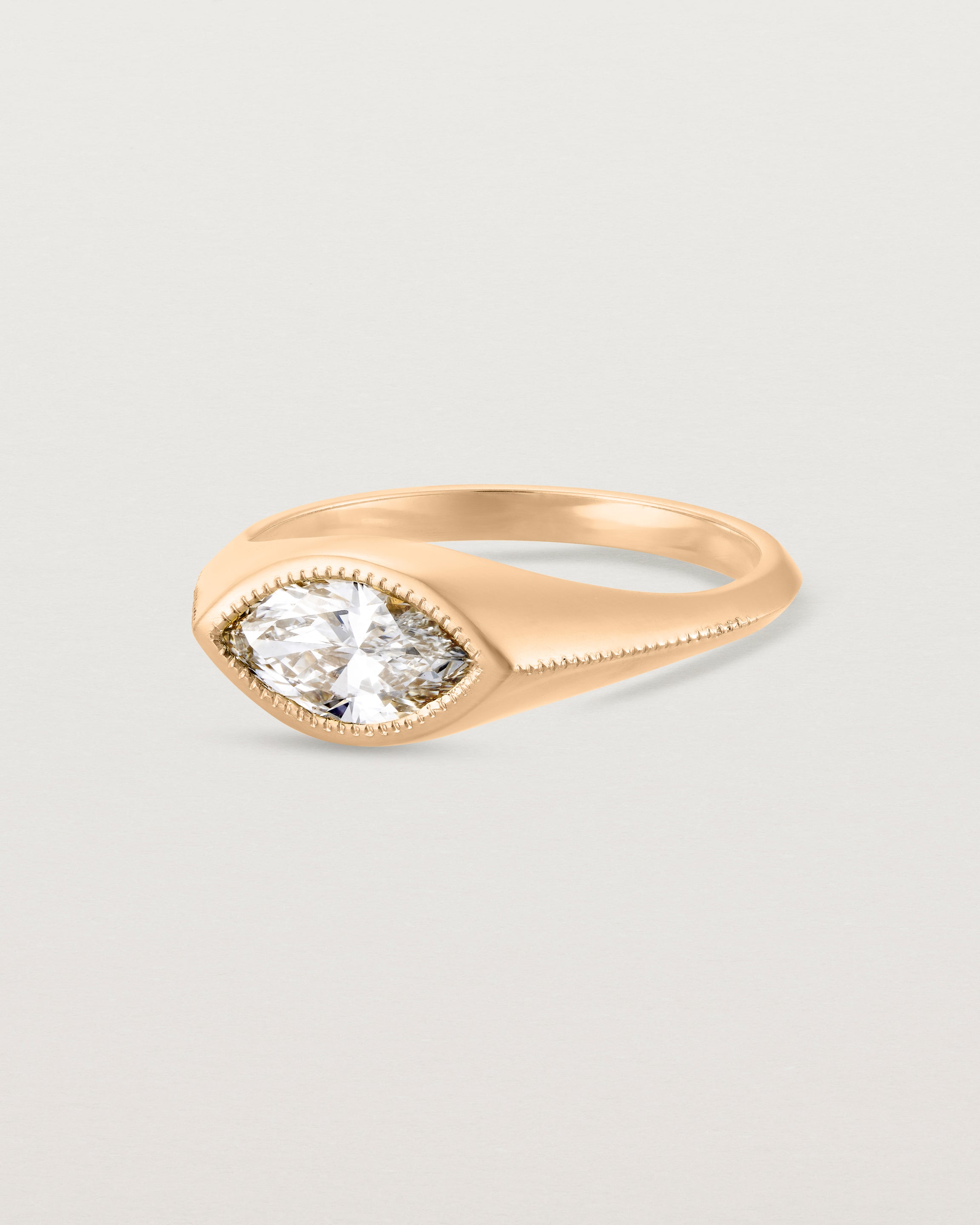 Angled view of the Átlas Marquise Signet | Laboratory Grown Diamond in rose gold, in a polished finish.