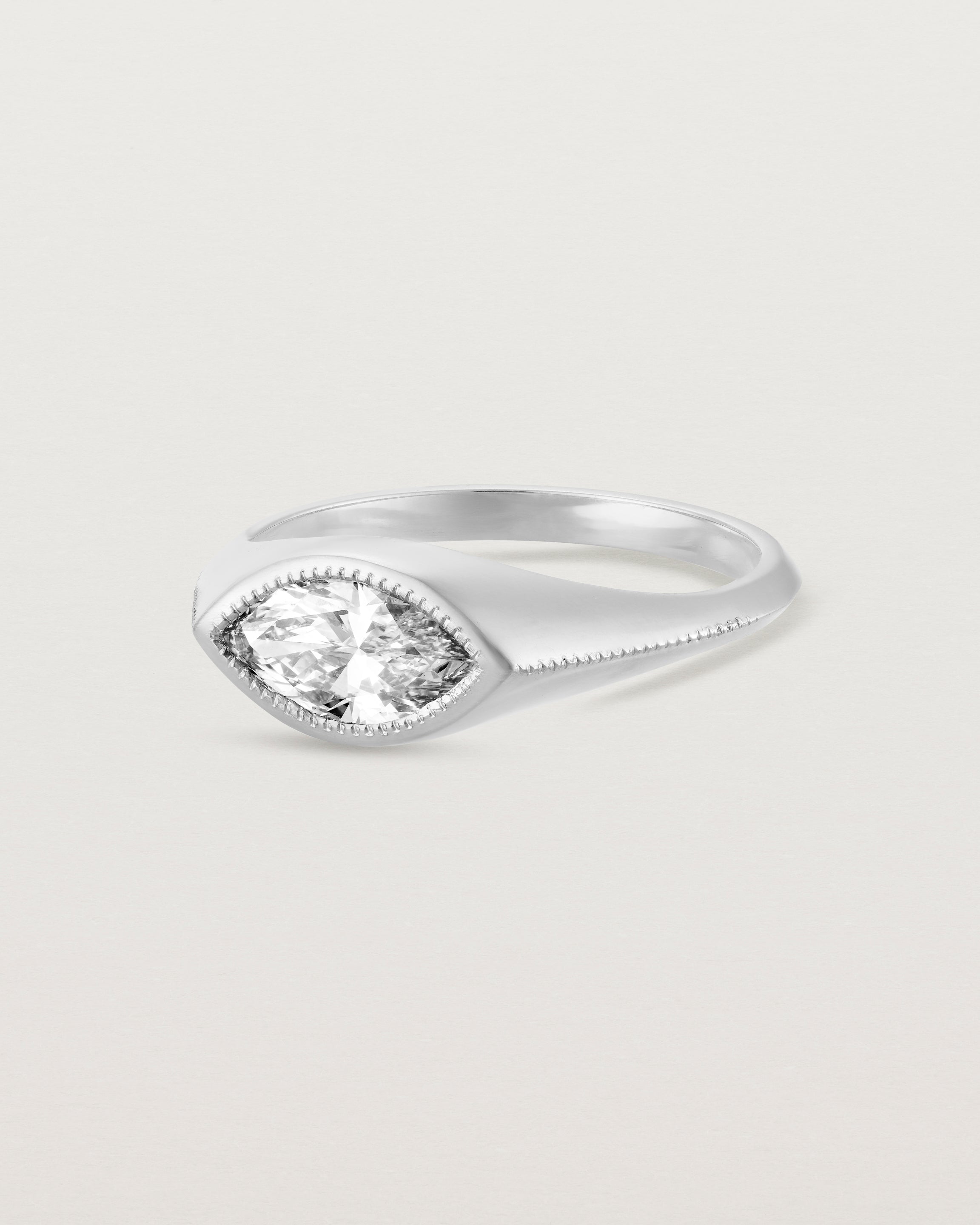 Angled view of the Átlas Marquise Signet | Laboratory Grown Diamond in white gold, in a polished finish.