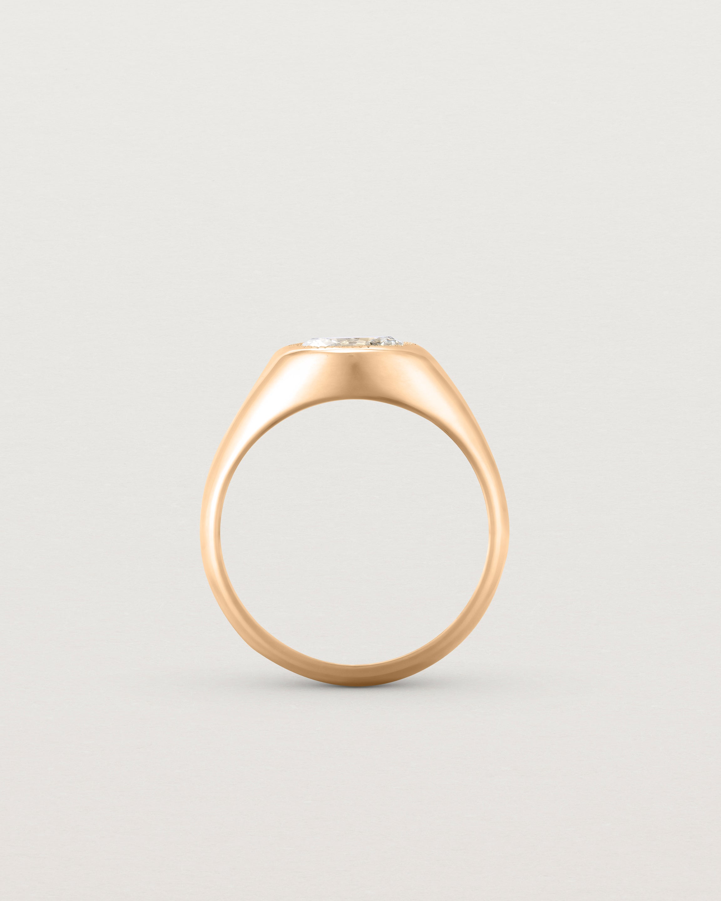 Standing view of the Átlas Oval Signet | Laboratory Grown Diamond in rose gold, with a polished finish.