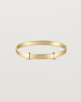 back image of the Toujours bangle plain in yellow gold