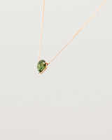 A Madagascan pear sapphire, is set in our classic slider pendant design. 