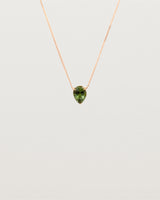 A Madagascan pear sapphire, is set in our classic slider pendant design. 