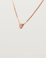 A necklace with a stunning 0.15ct pear cut pink diamond in a fine three claw pendant setting.