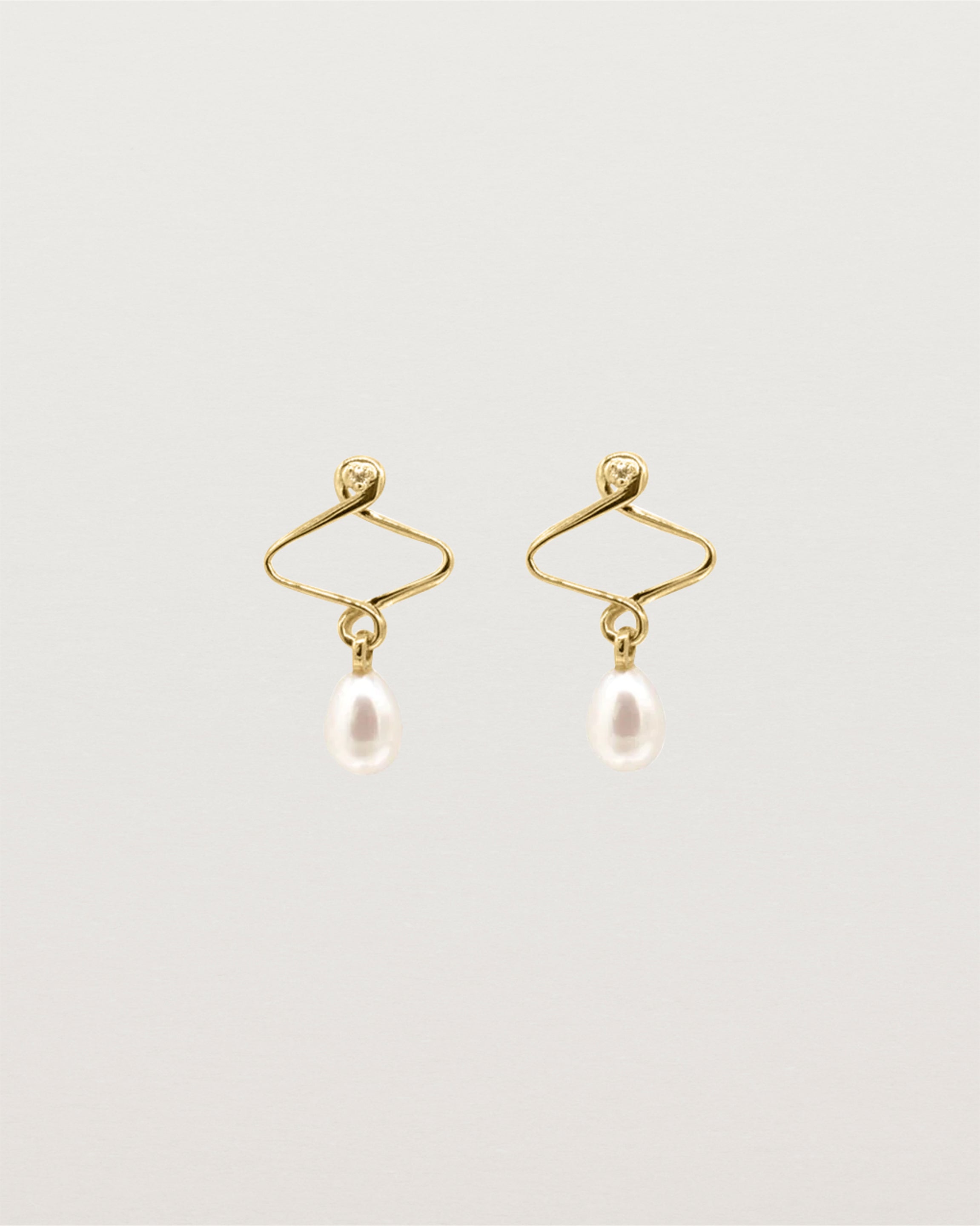 Pearl drop earrings with vintage detailing, crafted in yellow gold