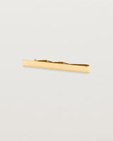 A yellow gold rectangular tie bar