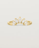 A white diamond, sun-beam inspired crown ring crafted in yellow gold