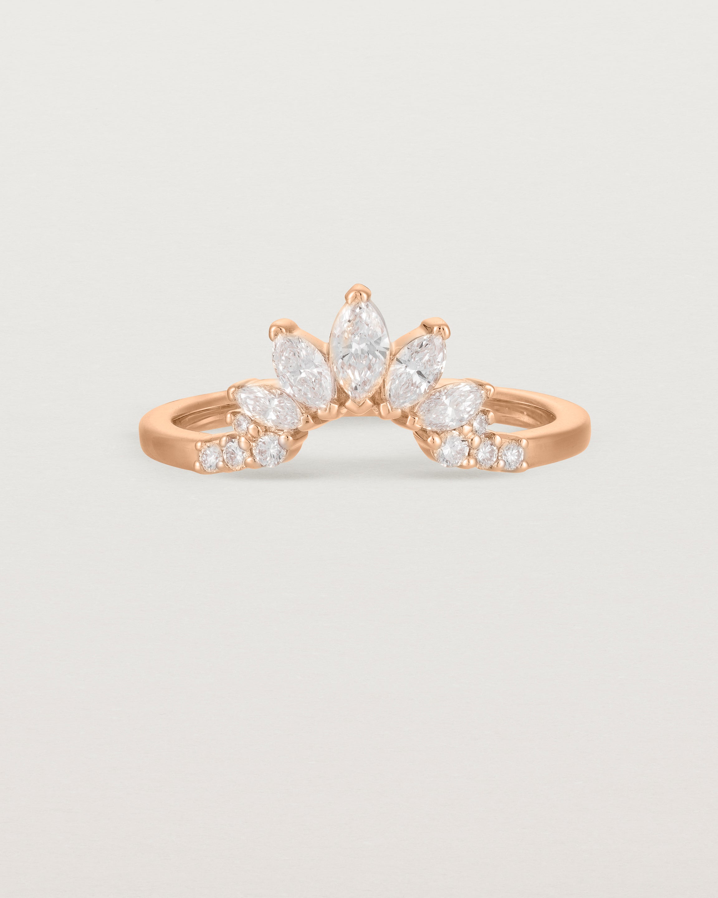 Fit three of a white diamond, sun-beam inspired crown ring crafted in rose gold