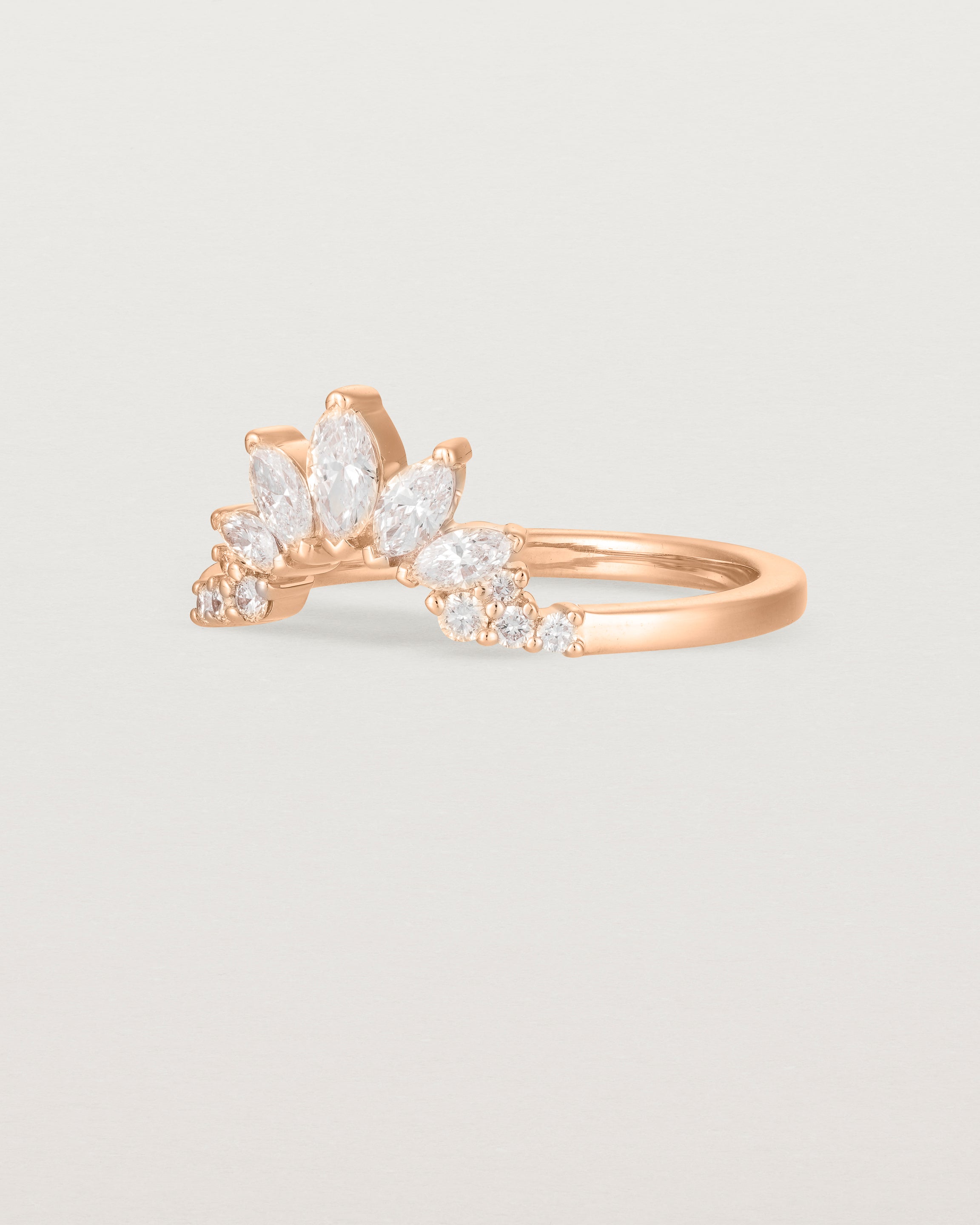 Fit three of a white diamond, sun-beam inspired crown ring crafted in rose gold