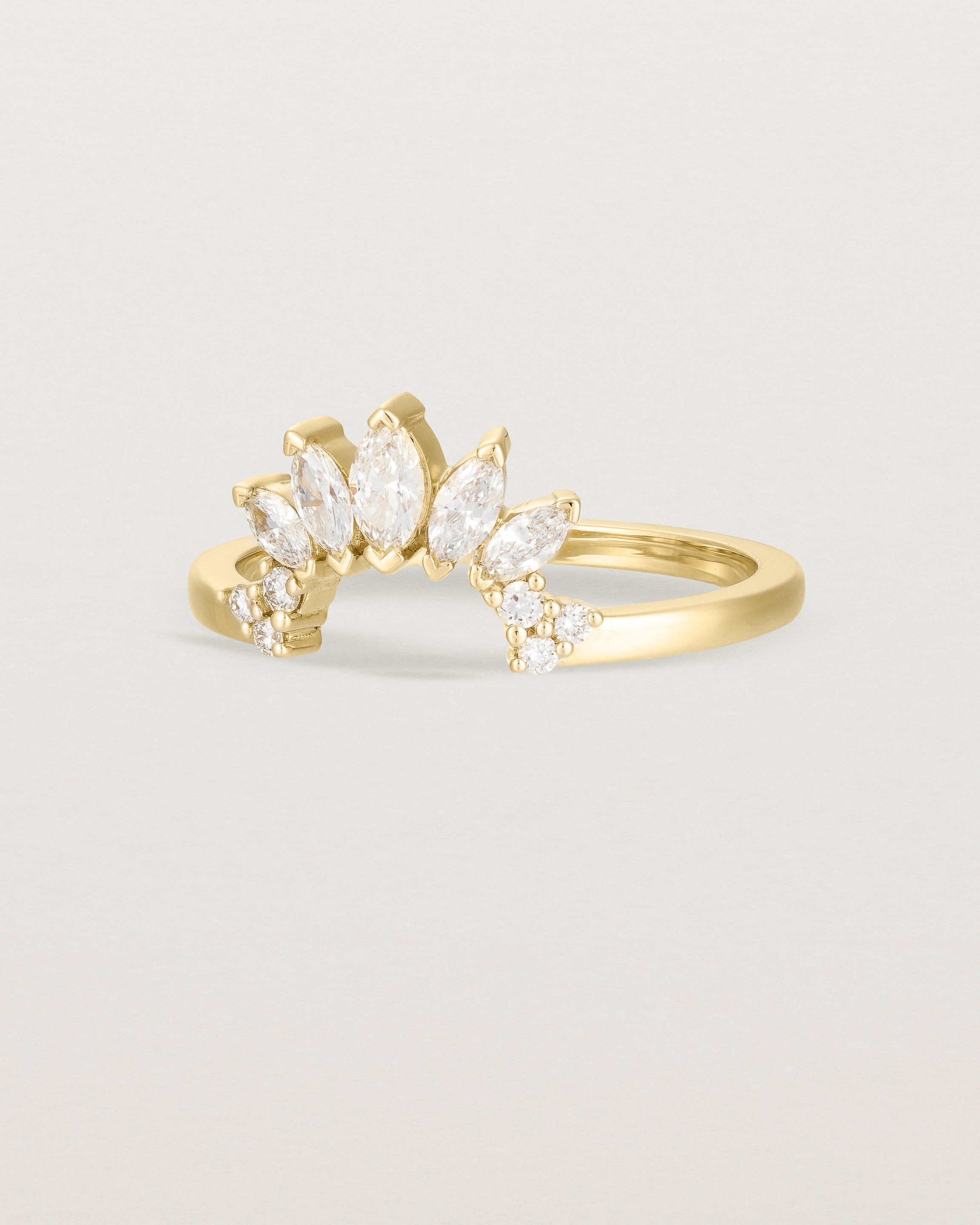 Fit two of a white diamond, sun-beam inspired crown ring crafted in yellow gold