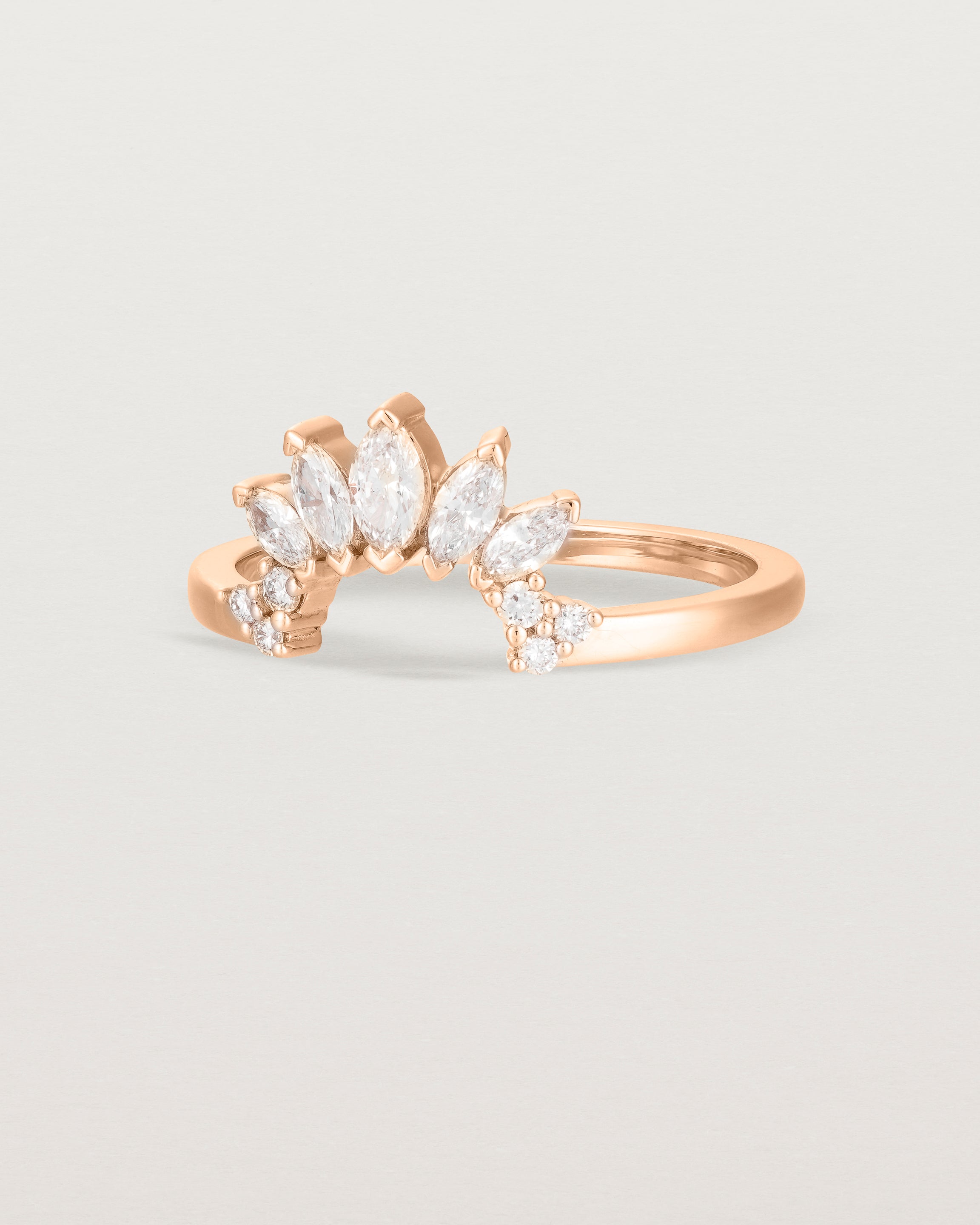 Fit two of a white diamond, sun-beam inspired crown ring crafted in rose gold