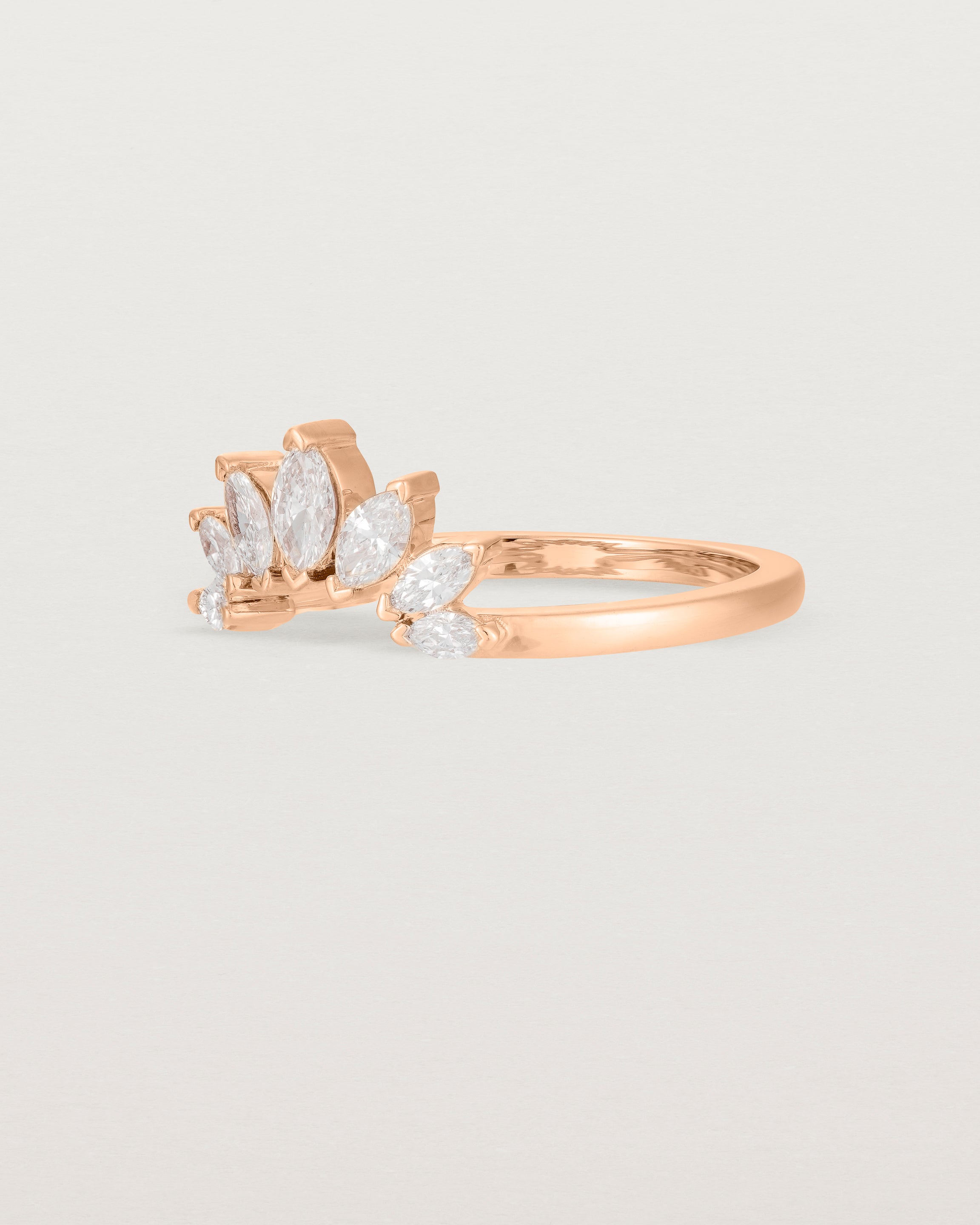 A white diamond, sun-beam inspired crown ring crafted in rose gold