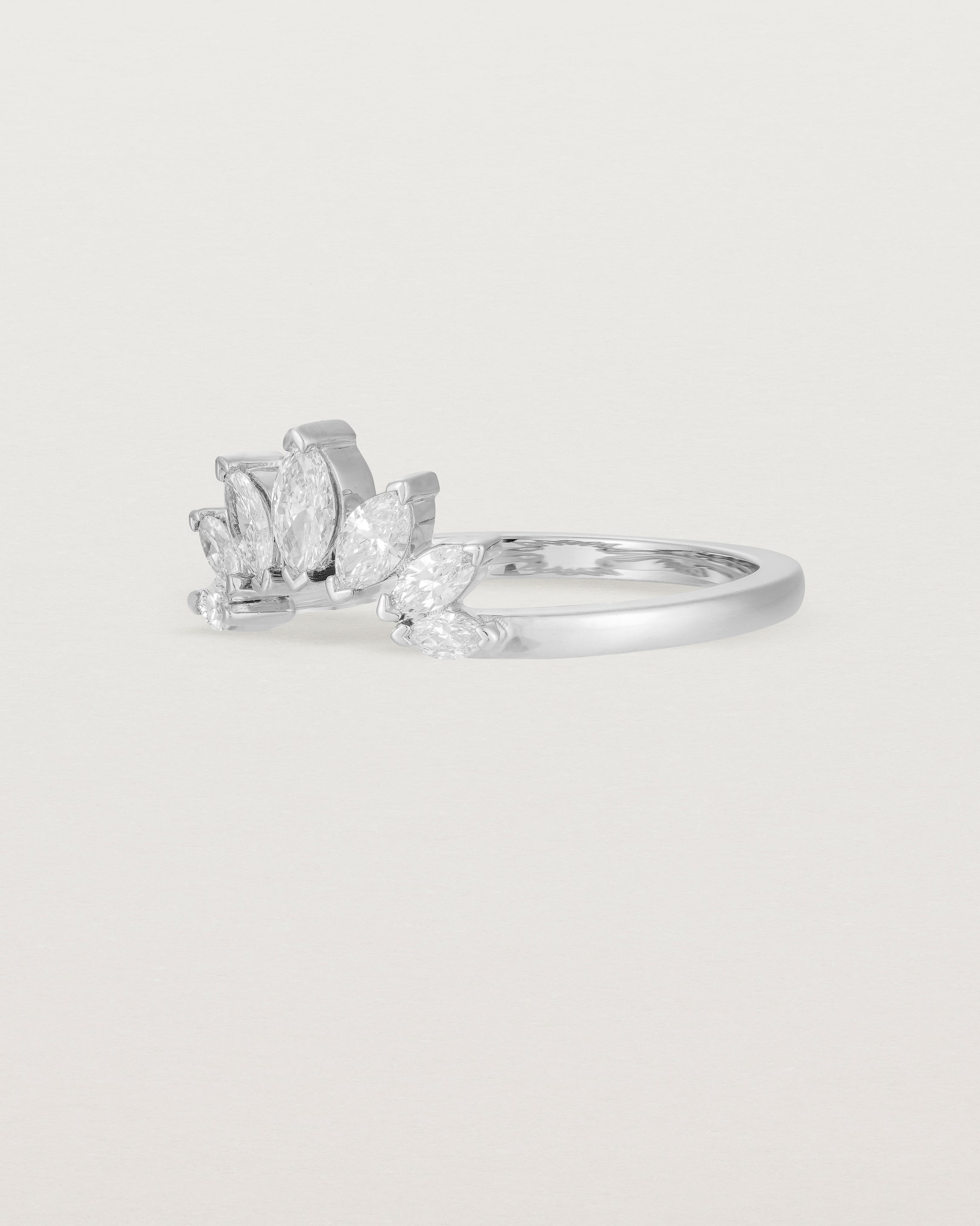 A white diamond, sun-beam inspired crown ring crafted in white gold