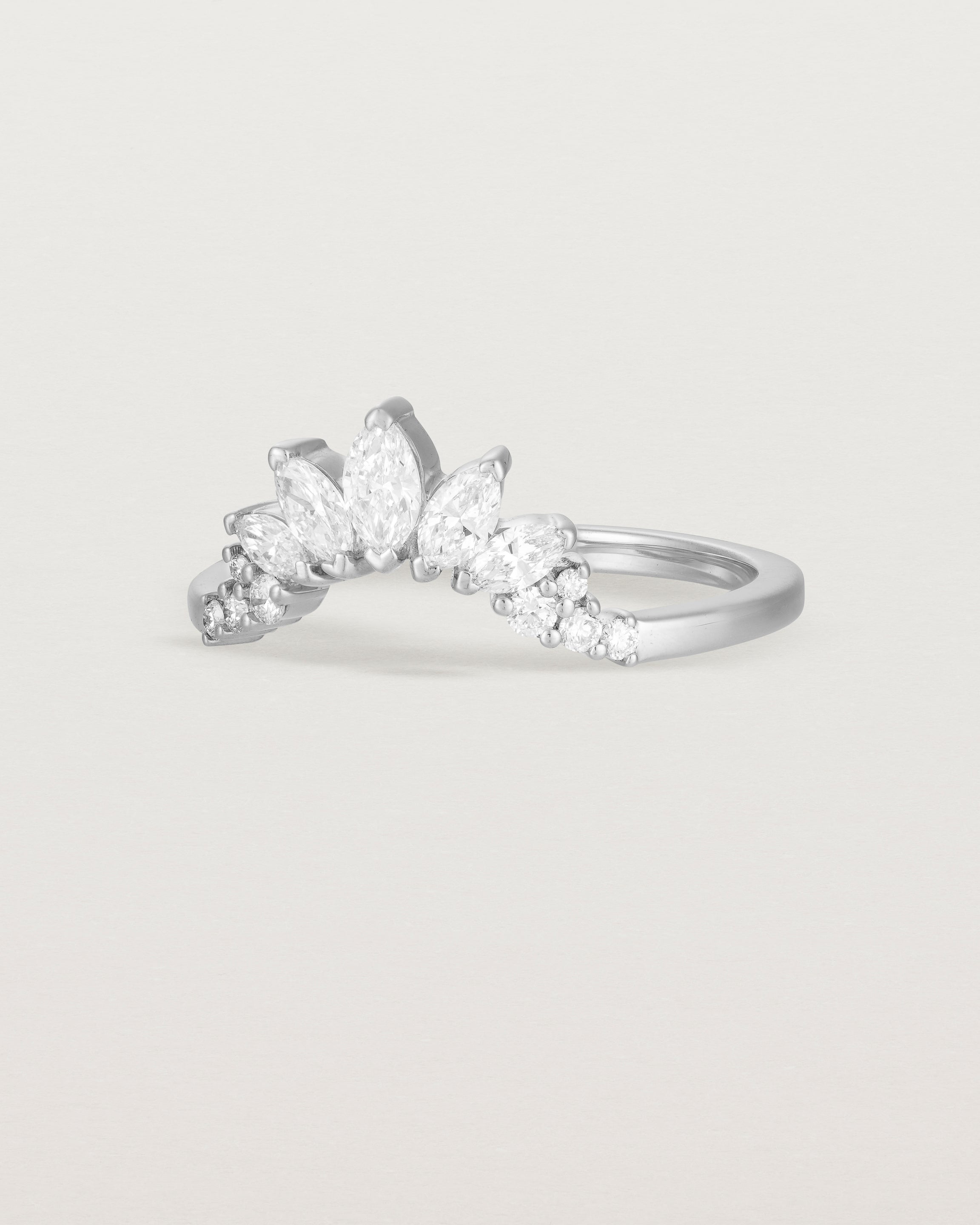 Size four of a sun-bream inspired white diamond crown ring, crafted in white gold