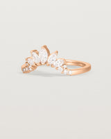 Size four of a sun-bream inspired white diamond crown ring, crafted in rose gold