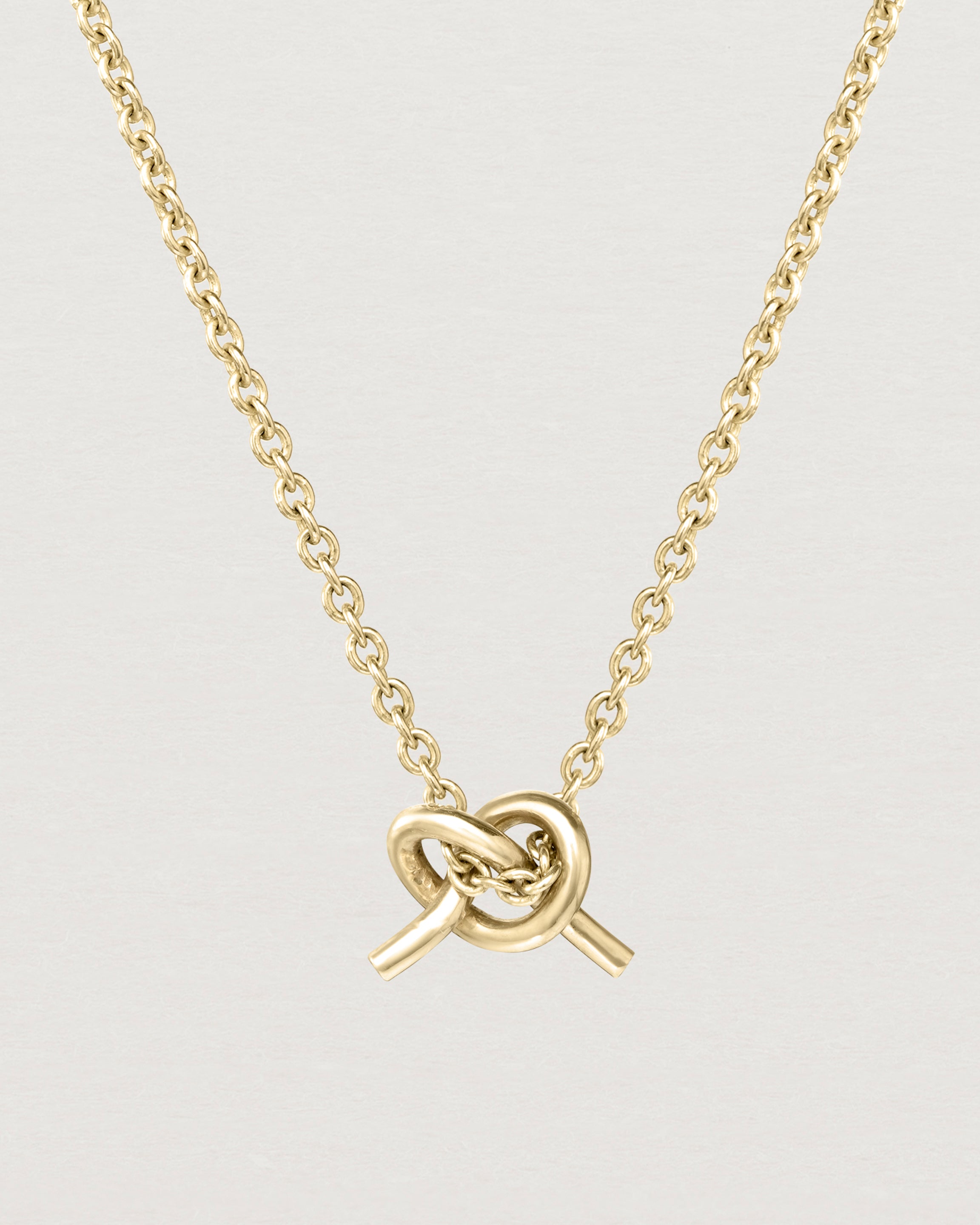 Front view of the Cara Necklace in yellow gold.