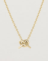 Front view of the Cara Necklace in yellow gold.