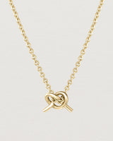 Front view of the Cara Necklace in yellow gold.