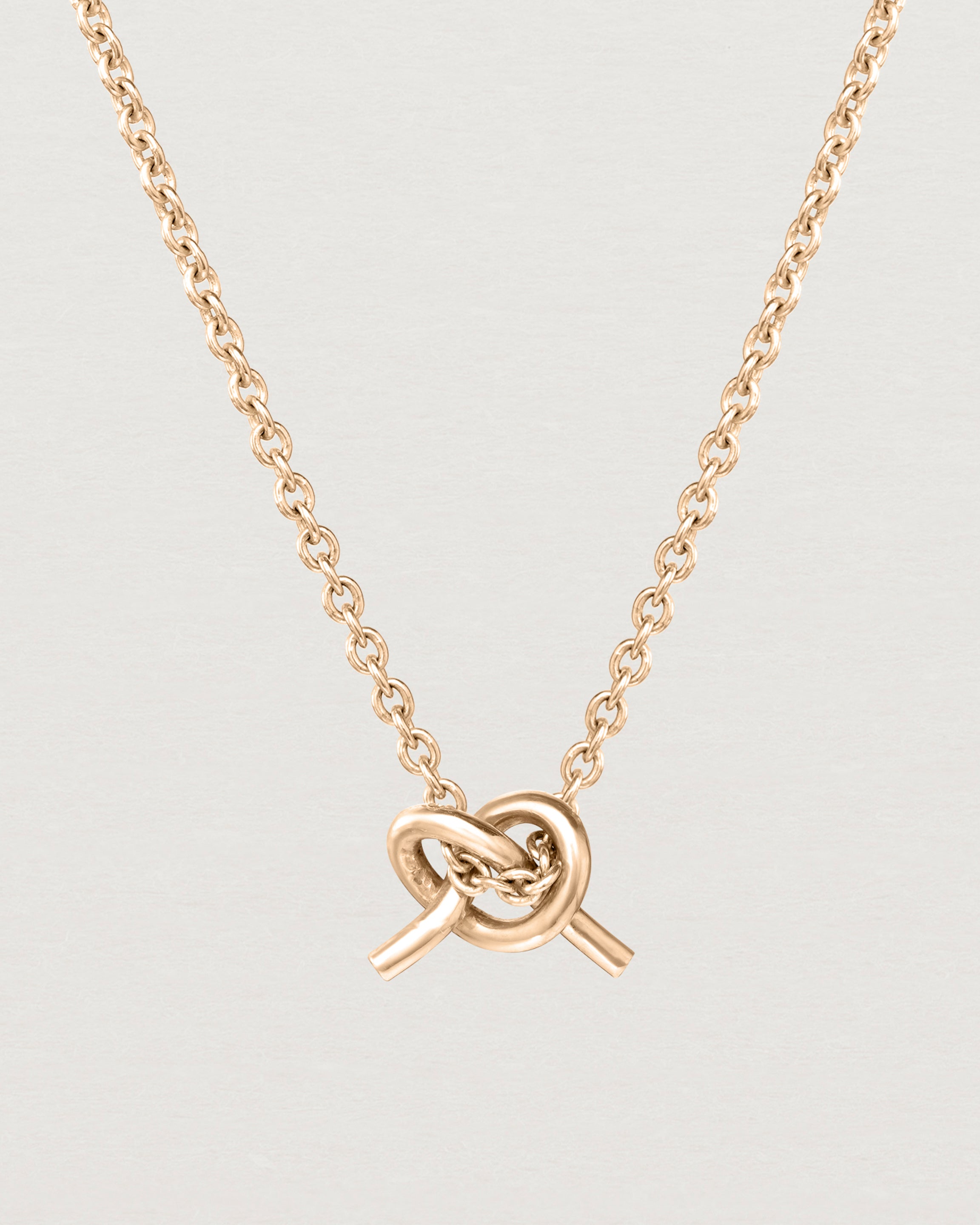Front view of the Cara Necklace in rose gold.