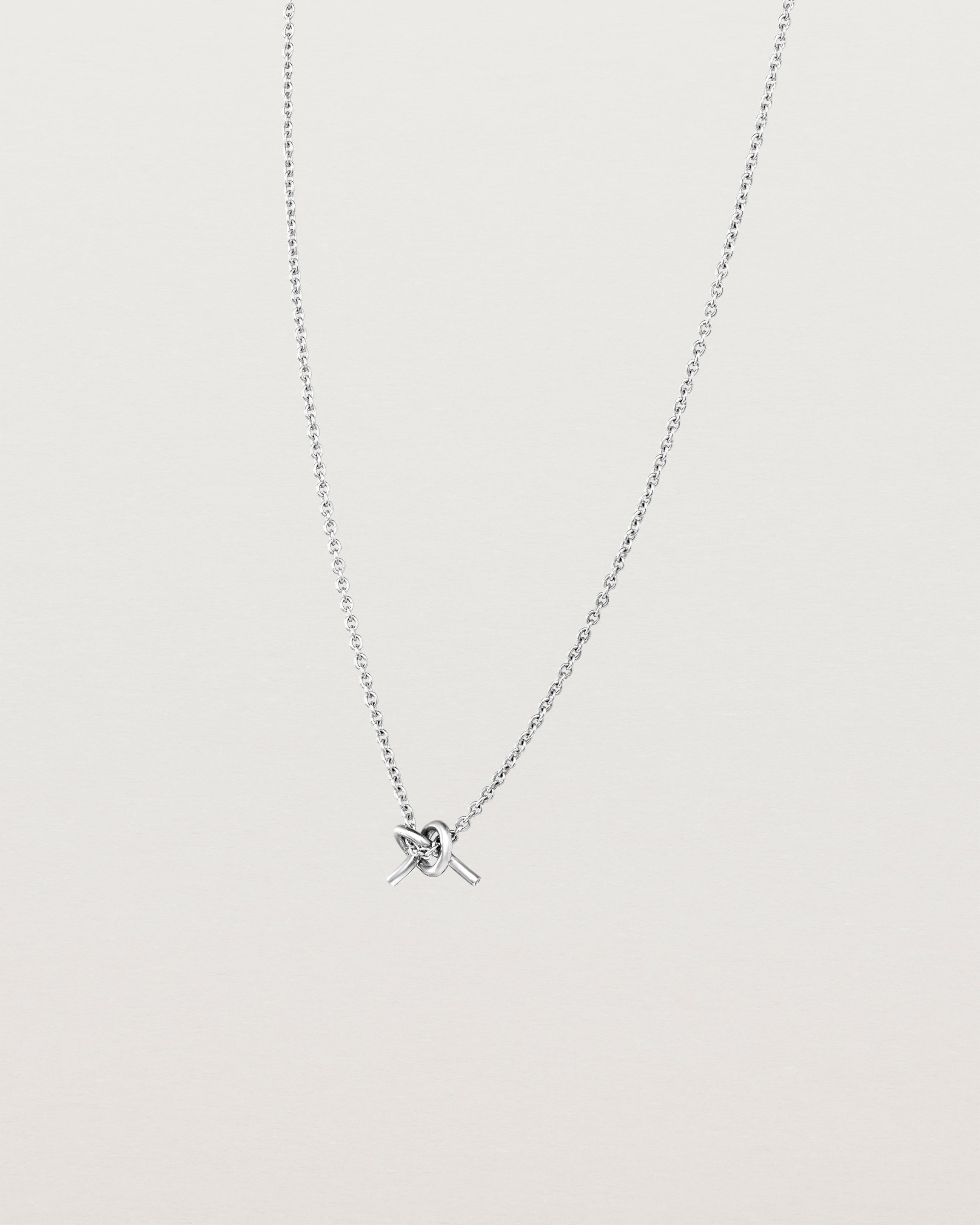 Angled view of the Cara Necklace in sterling silver.