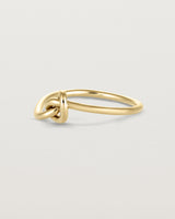 Angled view of the Cara Ring in yellow gold.