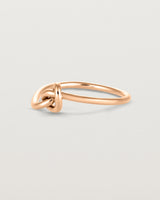 Angled view of the Cara Ring in rose gold.