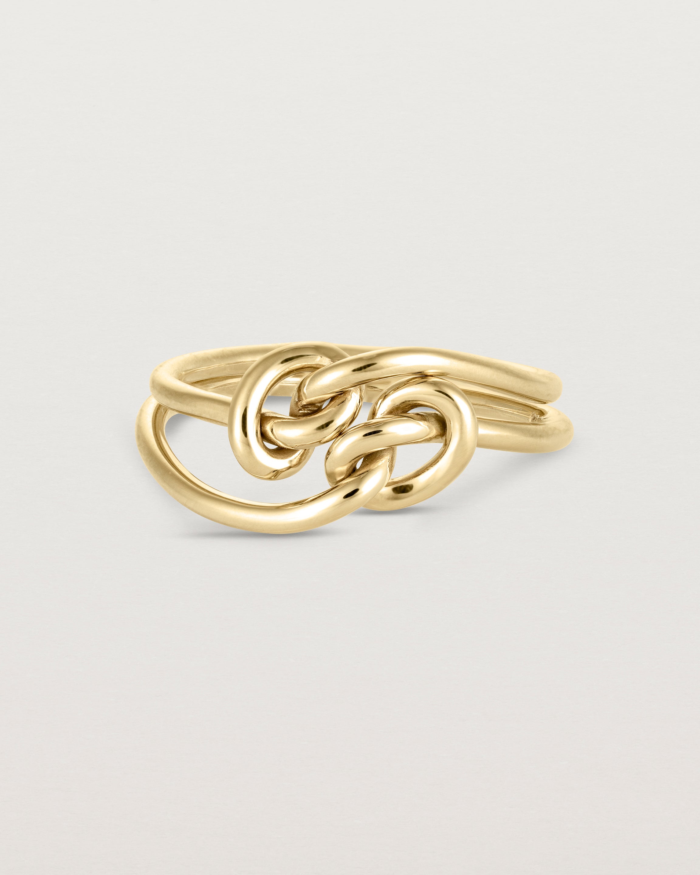 _label: Two Cara Ring's stacked together