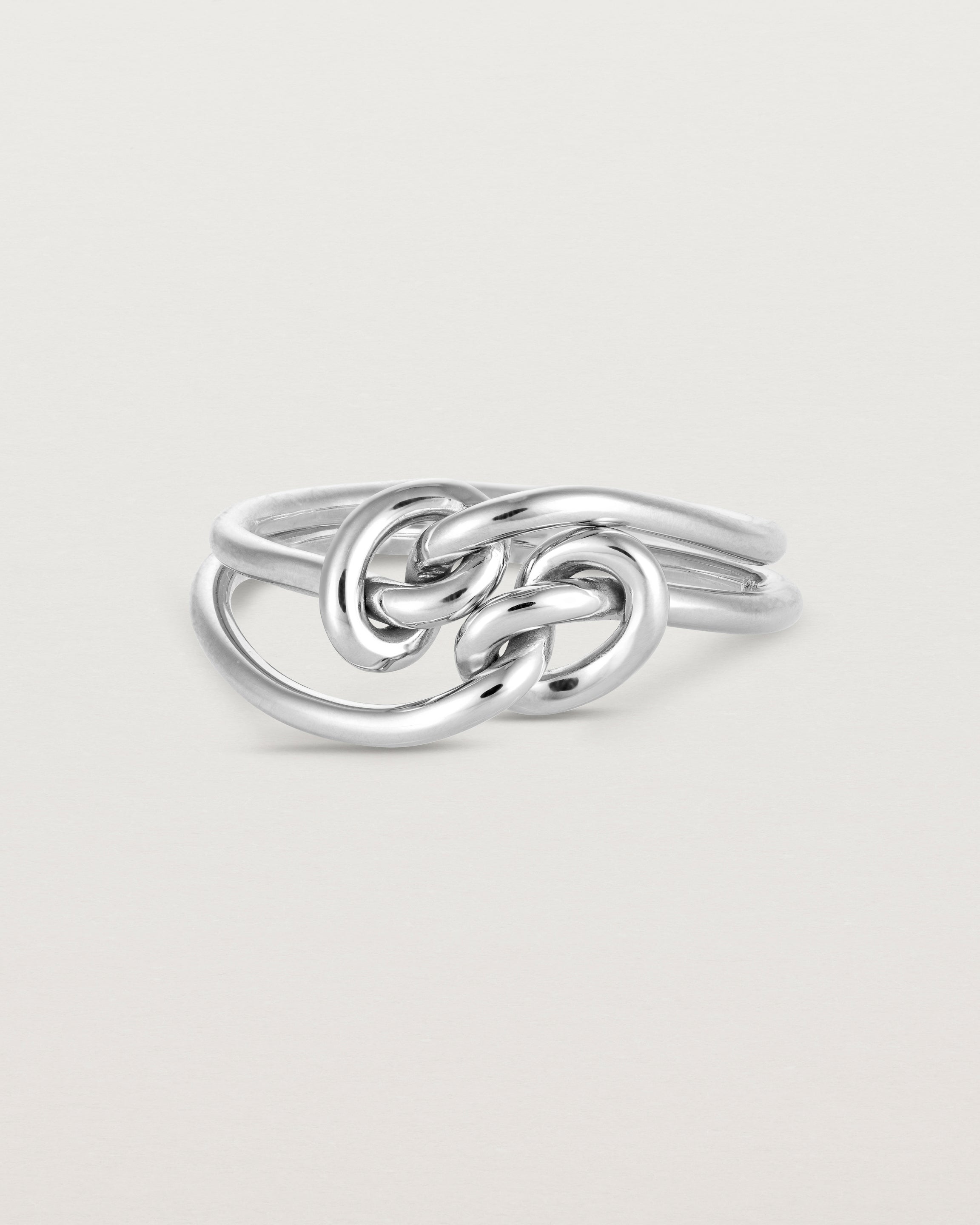 _label: Two Cara Ring's stacked together