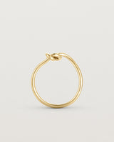 Standing view of the Cara Ring in yellow gold.