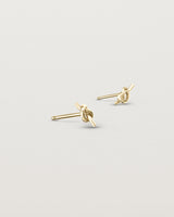 Angled view of the Cara Studs in yellow gold.