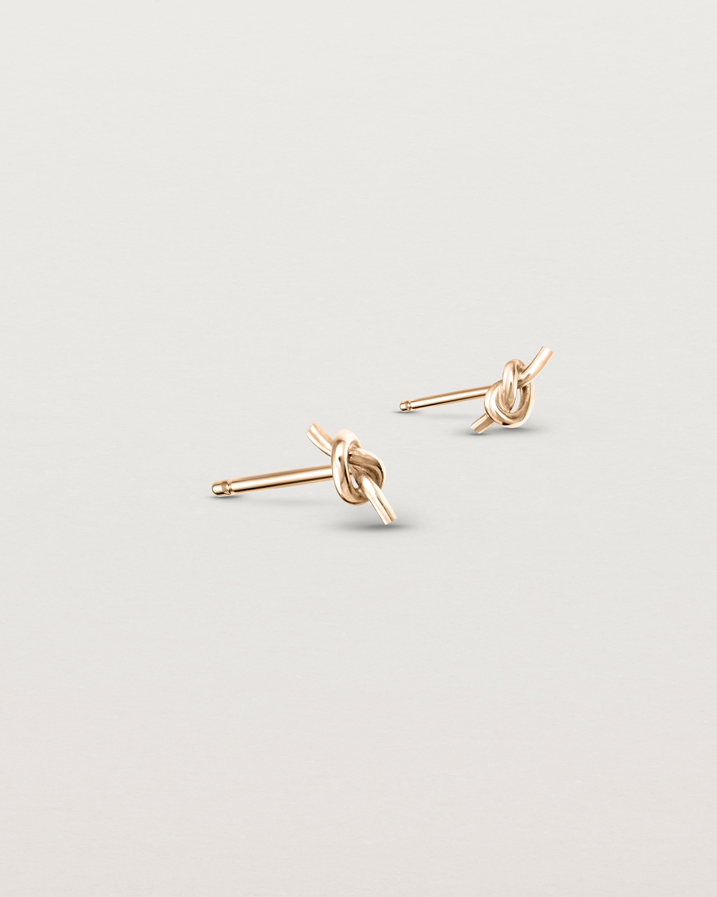 Angled view of the Cara Studs in rose gold.
