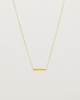 Front view of the Cascade Knife Edge Necklace | Diamonds in yellow gold.