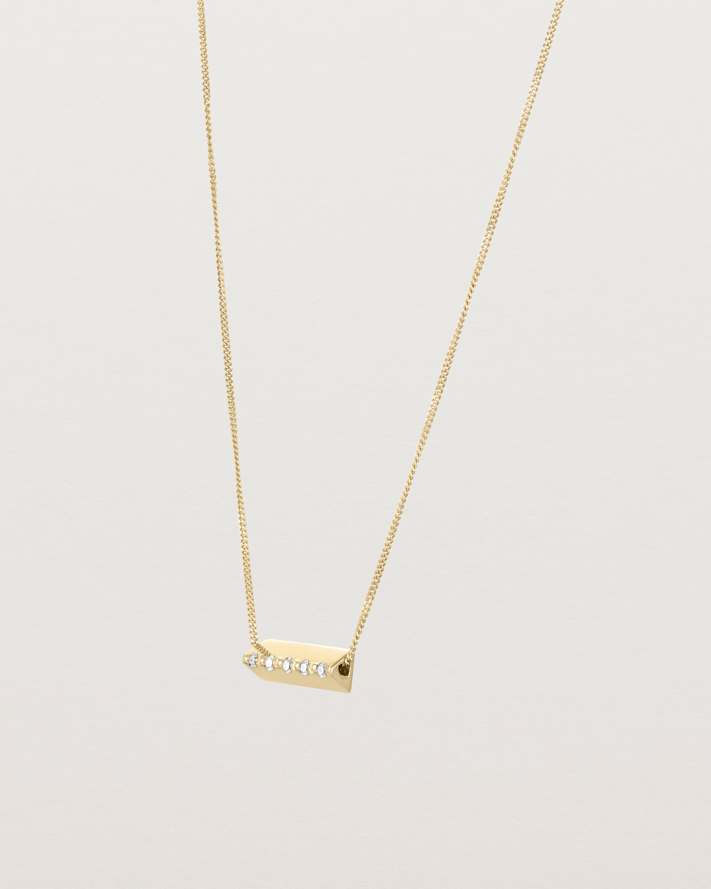 Angled view of the Cascade Knife Edge Necklace | Diamonds in yellow gold.