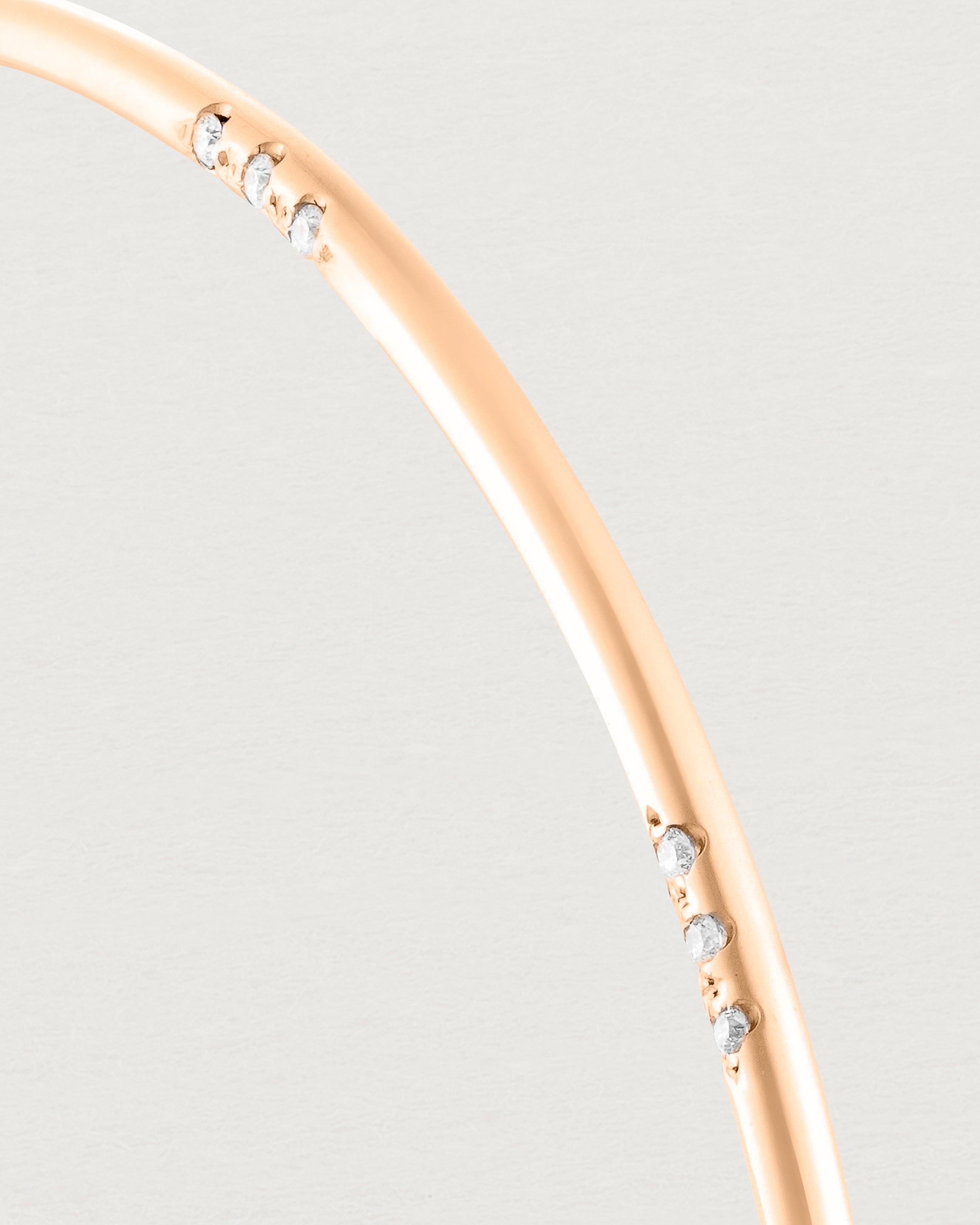 Close up of the Cascade Oval Bangle | Diamonds | Rose Gold