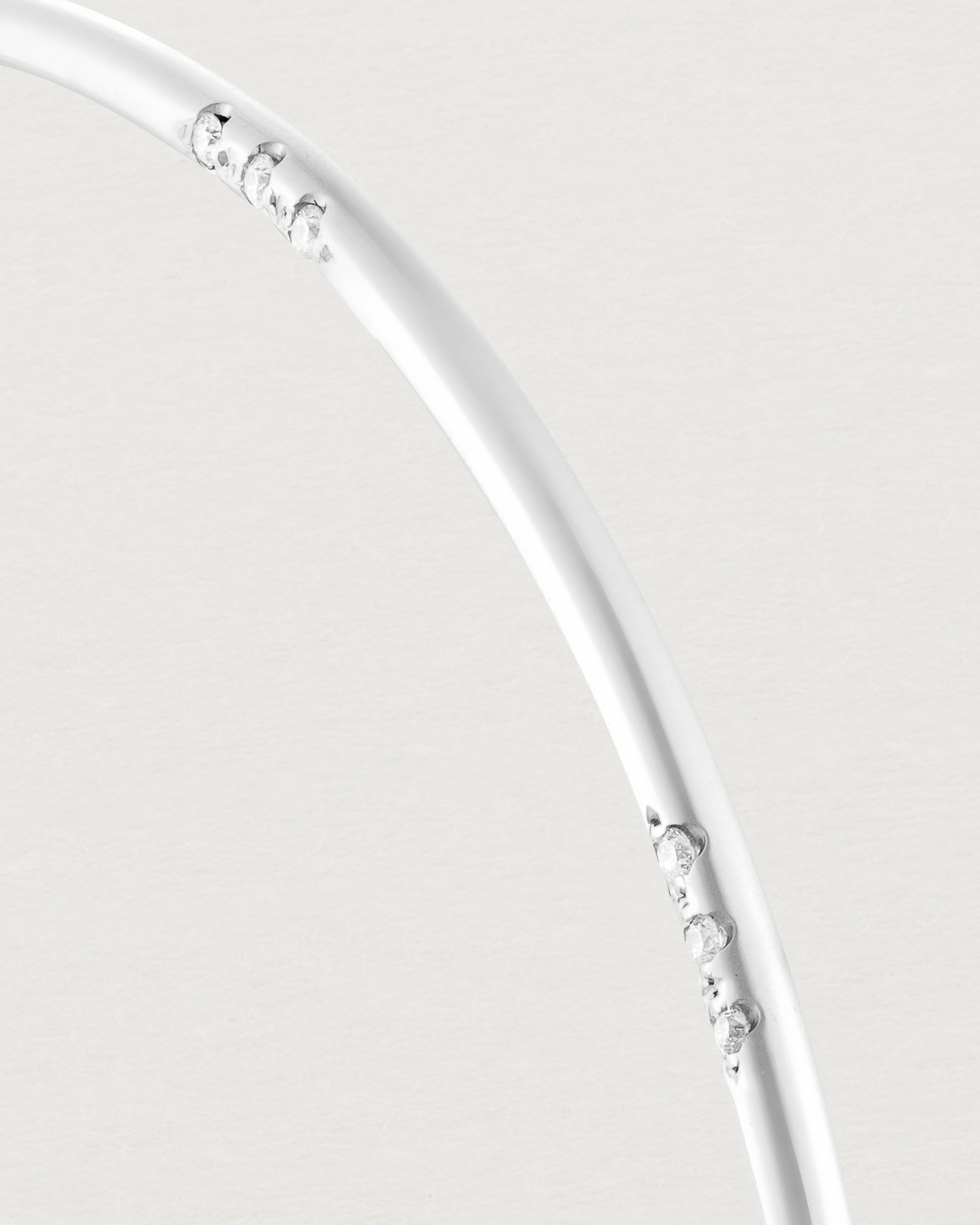 Close up of the Cascade Oval Bangle | Diamonds | White Gold