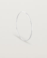 Standing view of the Cascade Oval Bangle | Diamonds | White Gold