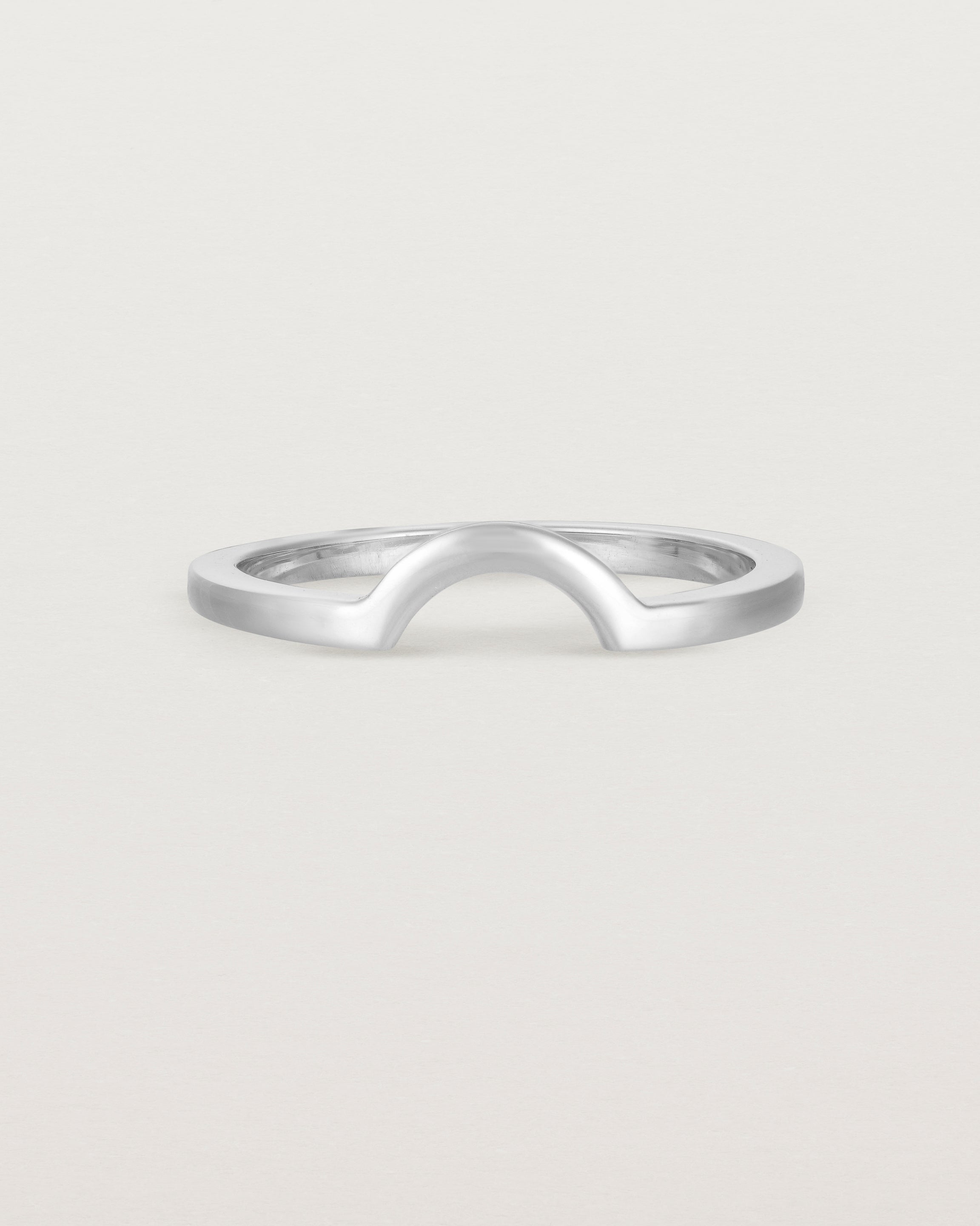 A classic small arc crown ring crafted in white gold