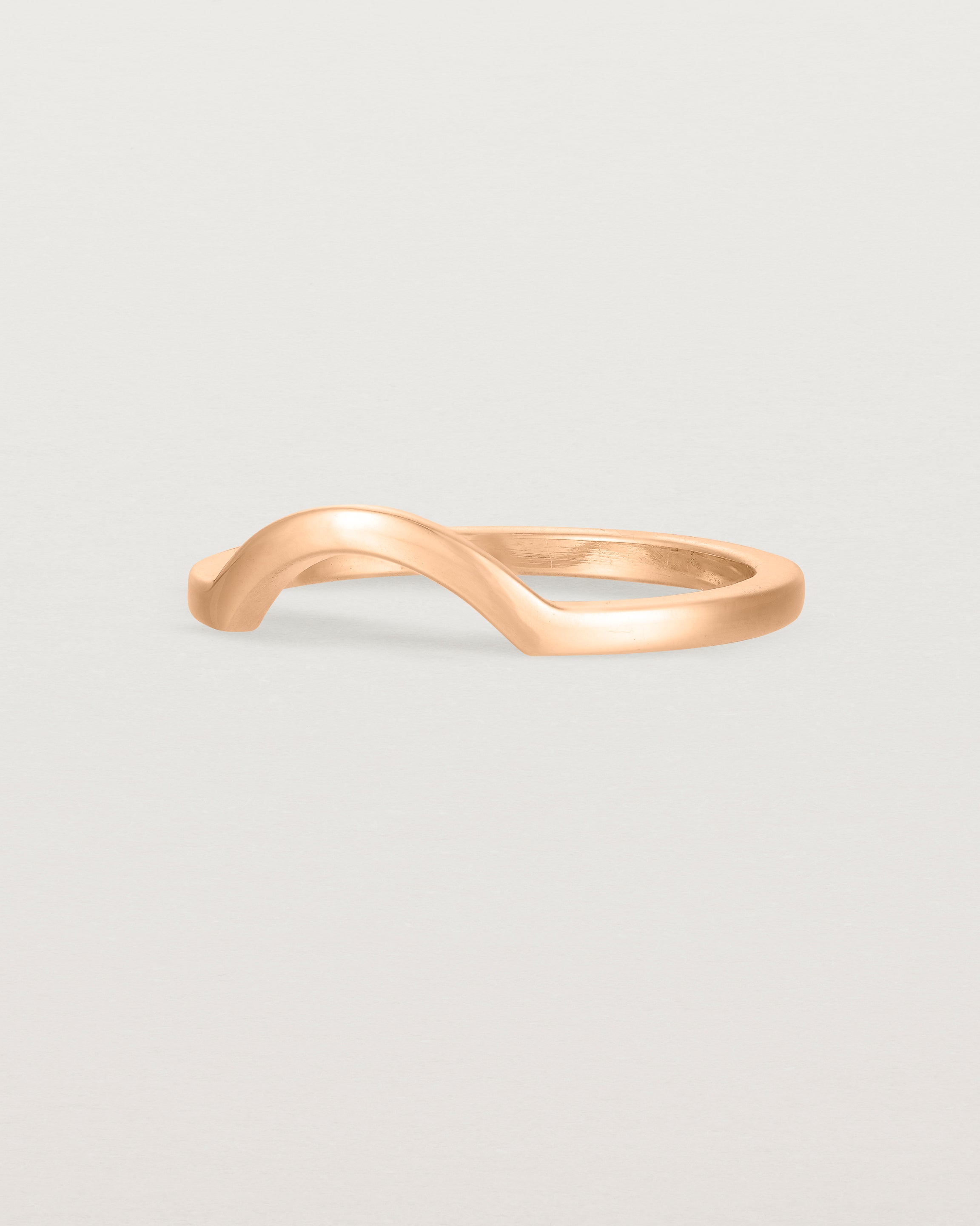 Fit three of a classic small arc crown ring, crafted in rose gold