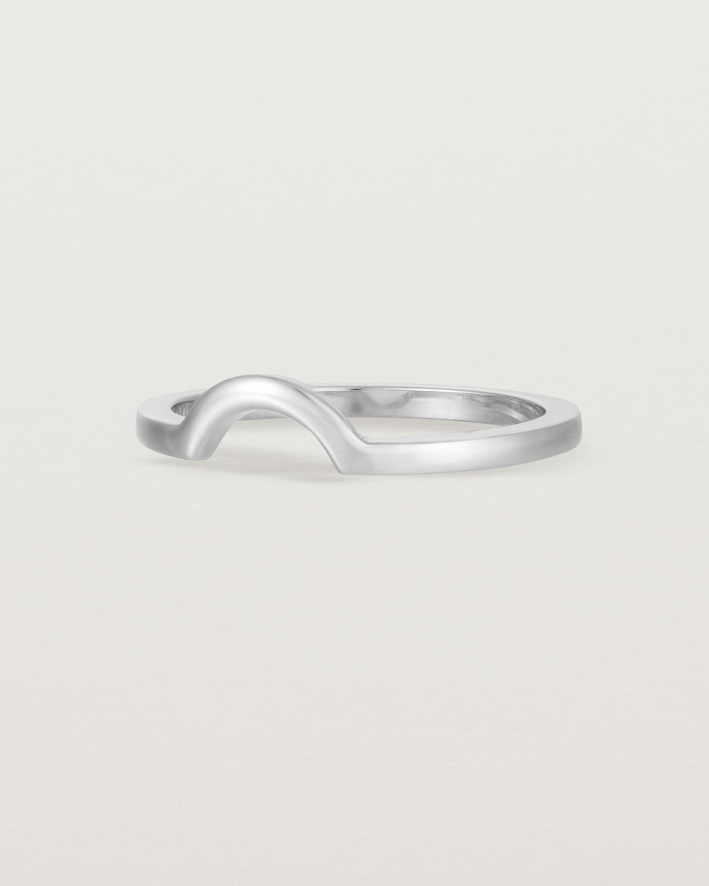 A classic small arc crown ring crafted in white gold
