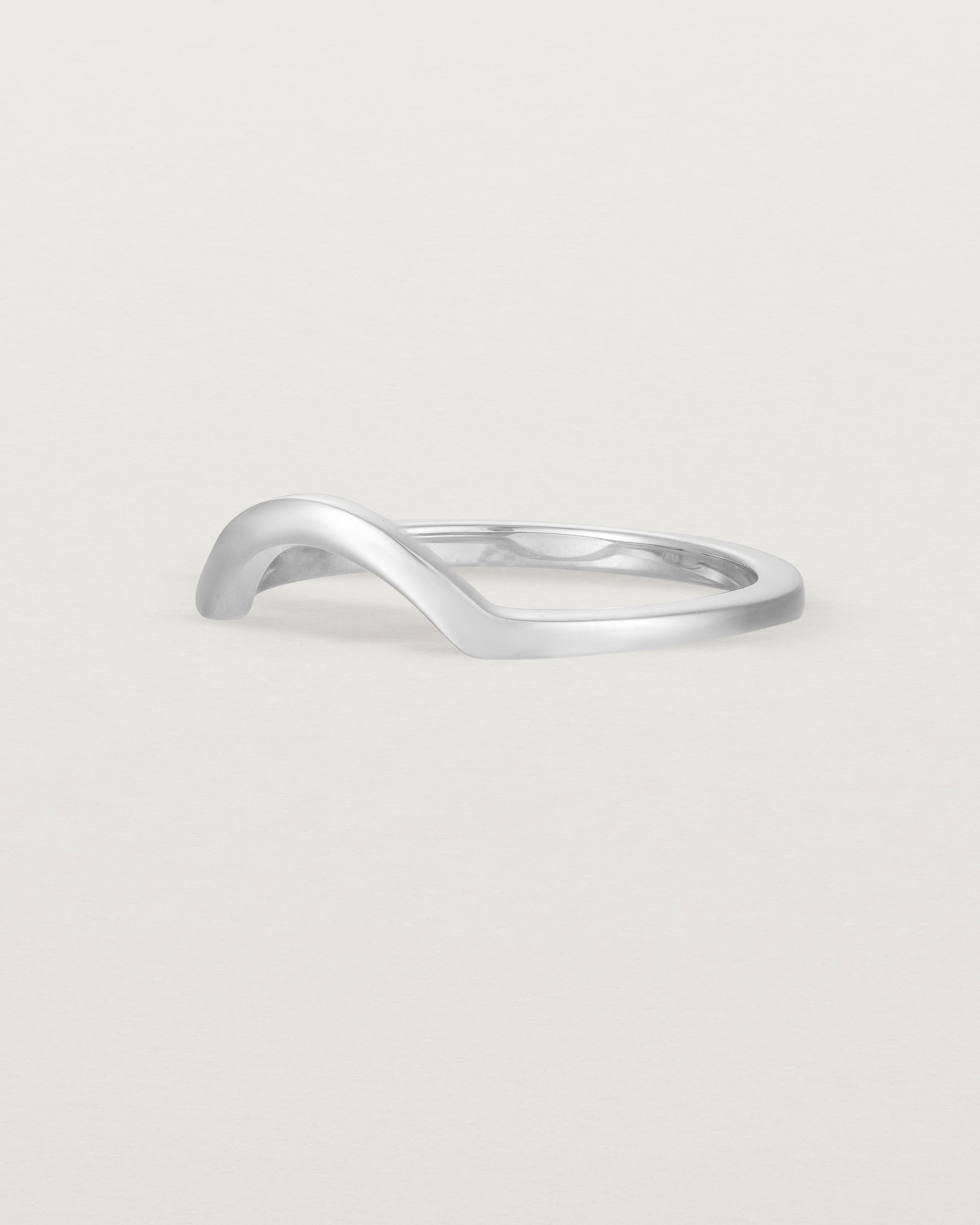 Fit four of a classic small arc crown ring, crafted in white gold