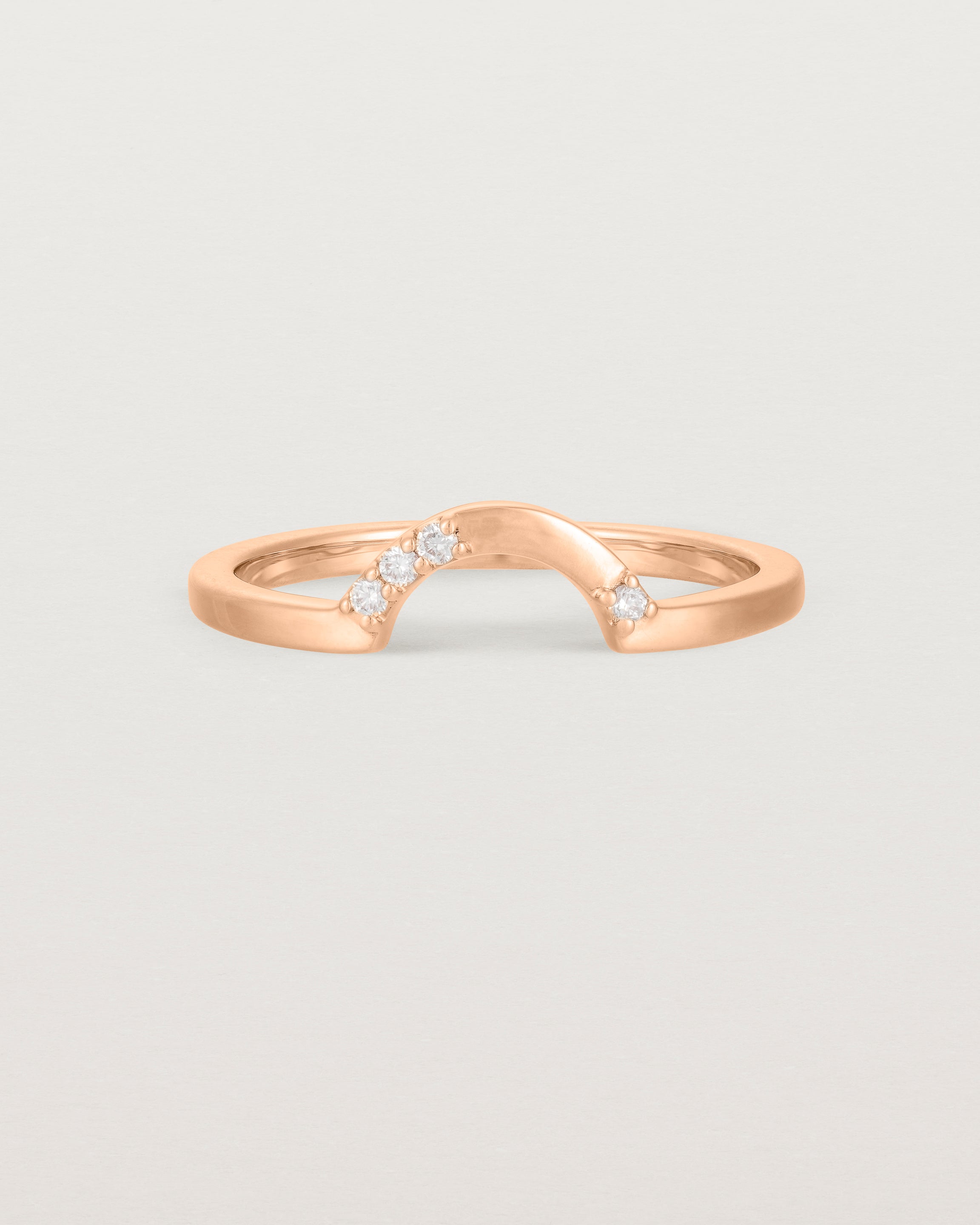 Fit two of a classic small arc crown ring featuring scattered white diamonds, crafted in rose gold