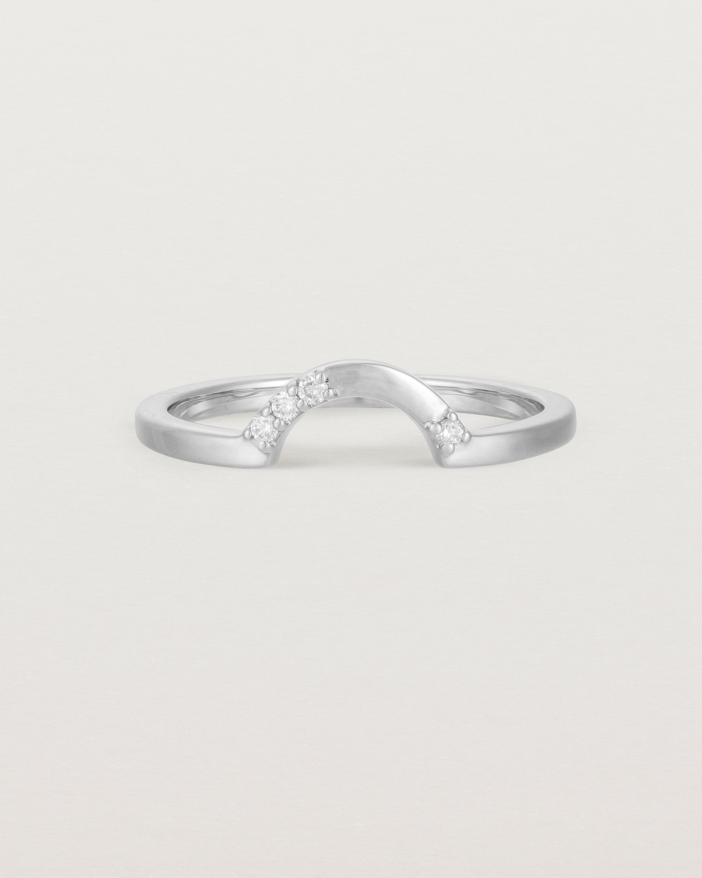 Fit two of a classic arc ring featuring scattered white diamonds, crafted in white gold